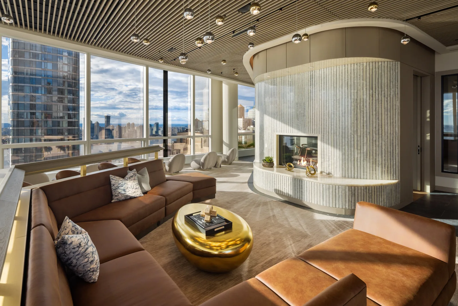The 42nd-floor sky lounge with sculptural fireplace and harbor views