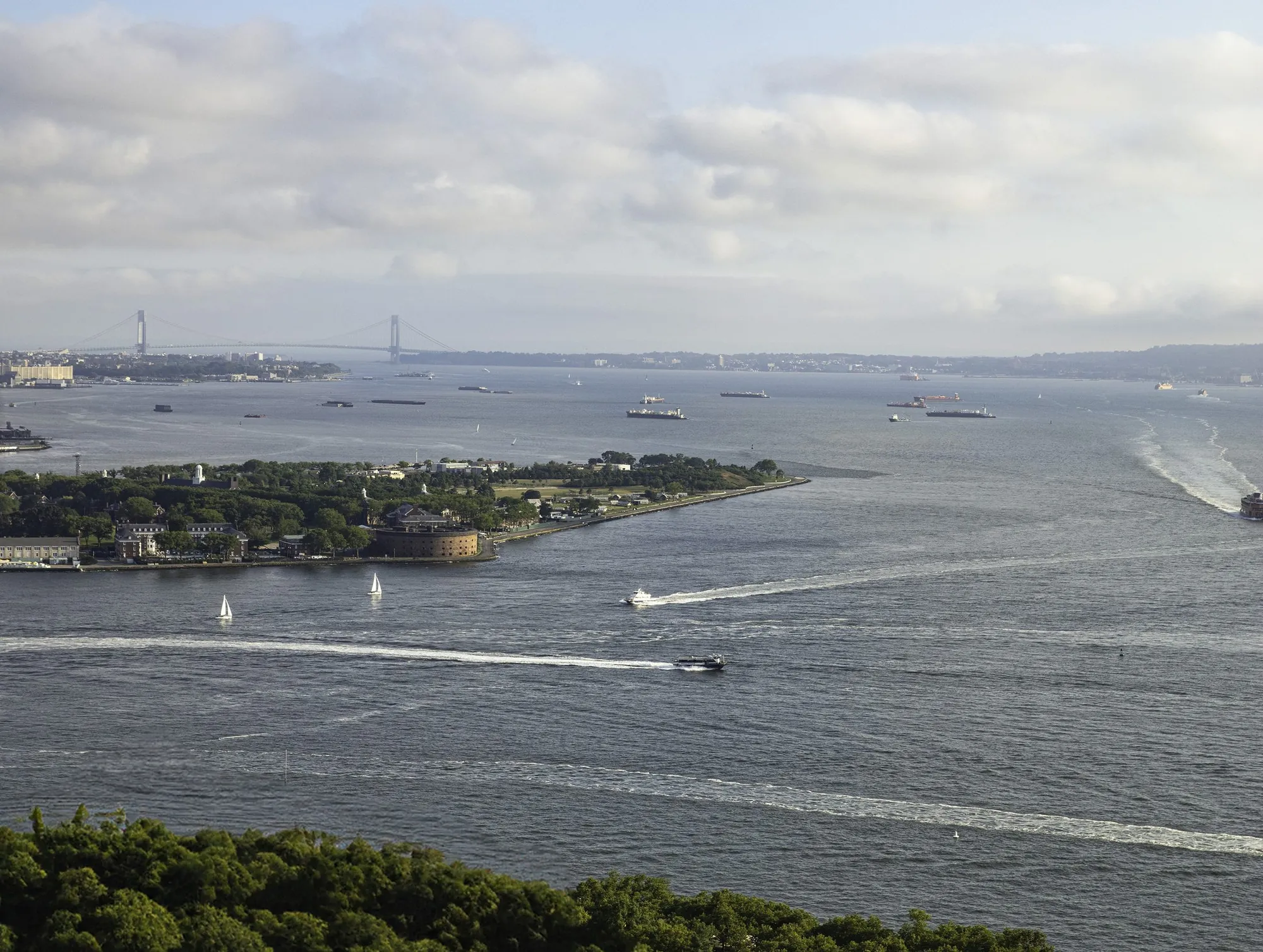 The southern view from 77 Greenwich over New York Harbor toward Governors Island and the Narrows