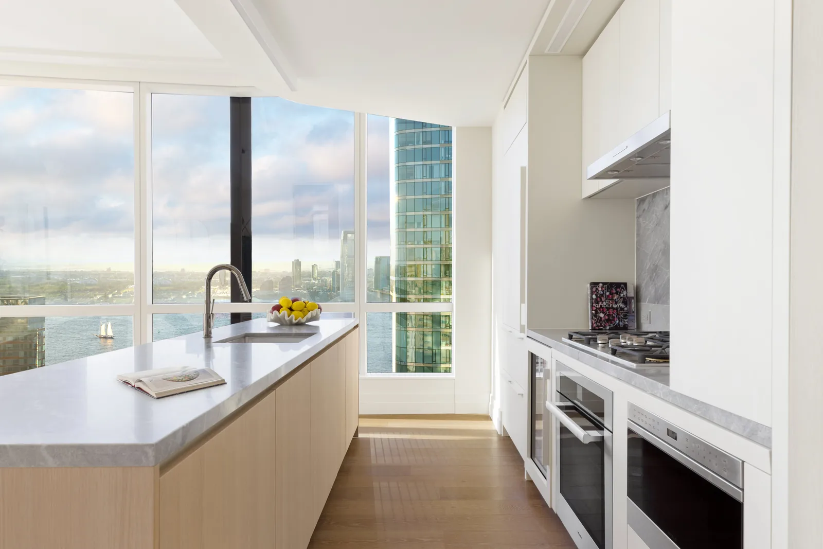 Poliform kitchen with Blue de Savoie marble island